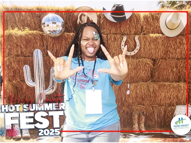 Professional photo booth setup for a McDonough, GA event with on-site attendant